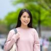 Young woman walking in Taipei city center Young woman walking in Taipei city center